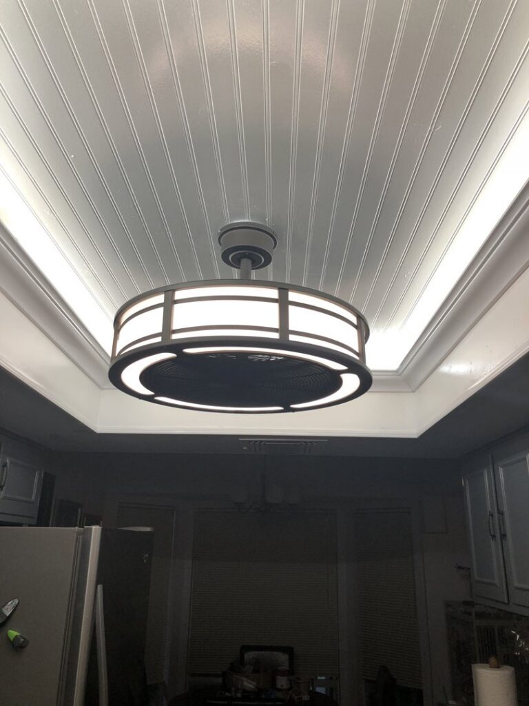 A modern ceiling fan with integrated LED lighting installed in a kitchen by Calvert Electrical Service in San Antonio, TX