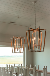 Two modern geometric chandeliers professionally installed by Anchor Electric LLC in Wilmington, NC