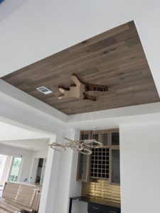 Modern decorative chandelier installation by LMV Electric LLC in Houston, TX