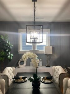 A modern chandelier installed in a dining room by Onsite Electrical Services in Raleigh, NC.