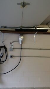 A large, modern chandelier expertly installed in a room by VIP Electrical Services in Naperville, IL.