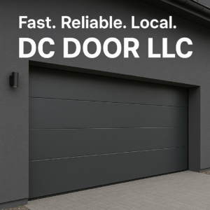 A newly installed modern dark gray garage door on a residential home by DC Door LLC in Littlestown, PA.