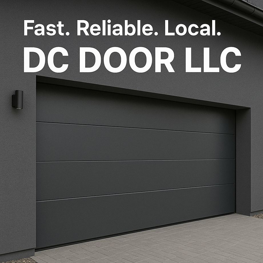 A newly installed modern dark gray garage door on a residential home by DC Door LLC in Littlestown, PA.