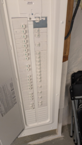 A newly installed modern electrical panel with multiple circuit breakers by MLP Services in Sharpsburg, MD
