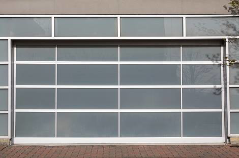A modern frosted glass panel garage door installed by Delta Garage Doors in Cleveland, OH