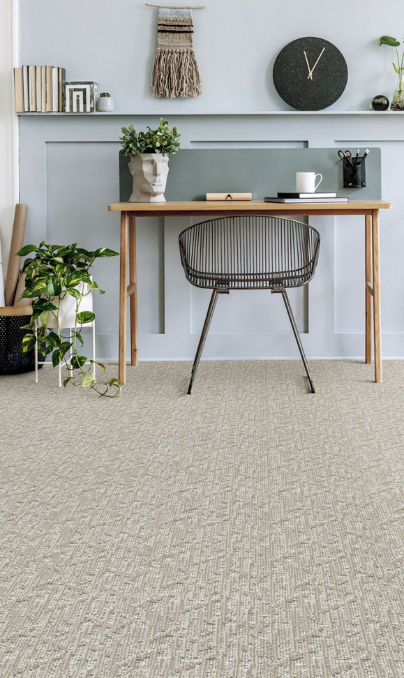 A modern home office featuring newly installed light patterned carpet by 180 Degree Floors in Nashville, TN.