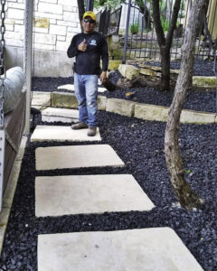 A modern horizontal slat wooden fence installed by Waldemar Landscape & Design in Austin, TX