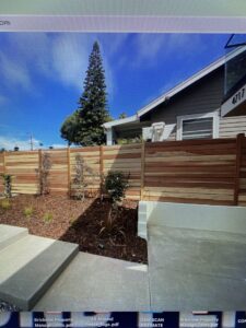 A modern horizontal wood fence installed for a residential property by All Around Fence Page in Imperial Beach, CA.