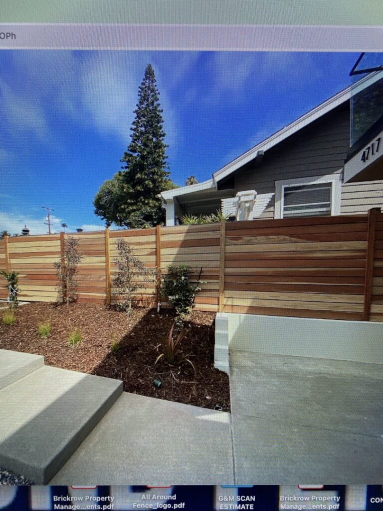 A modern horizontal wood fence installed for a residential property by All Around Fence Page in Imperial Beach, CA.