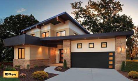 A modern house featuring a stylish black garage door, showcasing quality installation by Garage Door Alabama in Montgomery, AL.