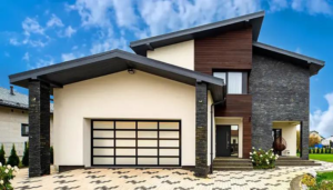 A modern house featuring a stylish garage door installation by Dylan's Garage Doors & Service in Columbia, MO.