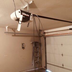 A modern house featuring a stylish white garage door, installed by Overhead Door Company of Central Missouri in Columbia, MO.