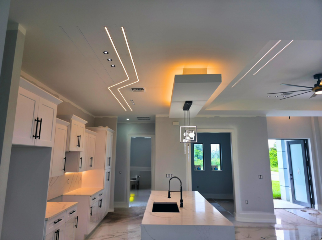 Modern kitchen featuring professional LED strip lighting and pendant light installation by NDLIGHT-Smart Home in NW 28th.