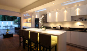 Modern kitchen with integrated lighting design and installation by Access Electrical in Indianapolis, IN.