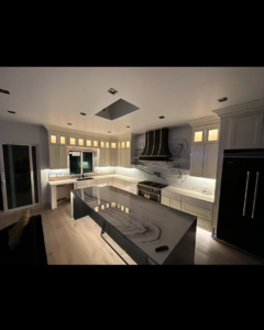Modern kitchen with new recessed ceiling, under-cabinet, and in-cabinet lighting installed by Bhogal Builders And Electric Inc. in Union City, CA.