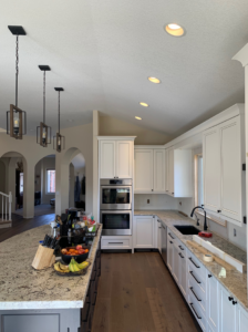 Modern kitchen with new recessed and pendant lighting installed by Grason Electric in Fort Collins, CO.