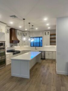 Modern kitchen featuring recessed and pendant lighting installed by Pro Solutions Electric in Glendale, AZ.