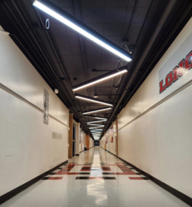 Modern LED lighting installation in a hallway by Pro-Master Electric, LLC in Waxahachie, TX