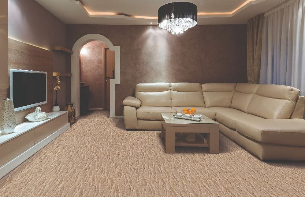 A modern living room featuring new carpet installation by Seacoast Flooring in Saco, ME.