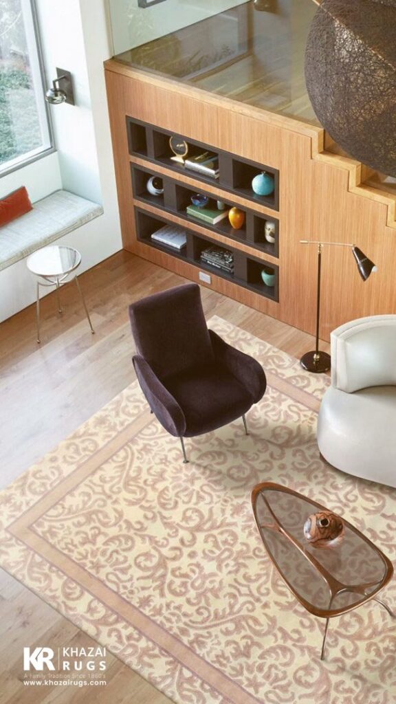 A modern living room featuring a light-colored patterned rug provided by Khazai Rugs in Lexington, KY