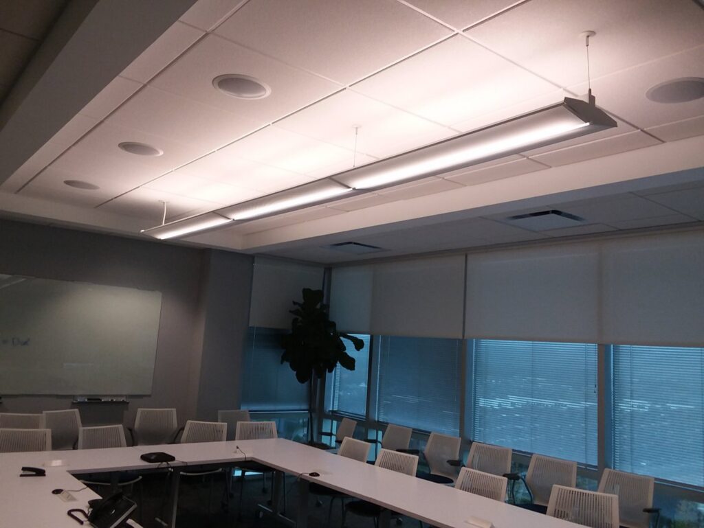 Modern office conference room with linear LED lighting by Empower Electric, LLC in Nashville, TN.
