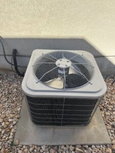 A modern outdoor AC unit installed by CSA HVAC Services in Orem, UT.