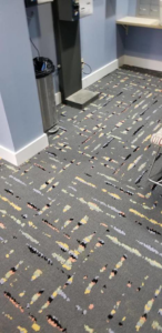 A modern patterned carpet installation in a commercial space by Point Place Flooring in Toledo, OH.