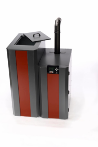 A modern pellet boiler unit with a chimney pipe, representing heating solutions from Kedel Boilers in Portland, ME.