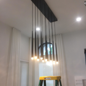 A modern multi-pendant light fixture professionally installed by Electriciansonway in Hollywood, FL