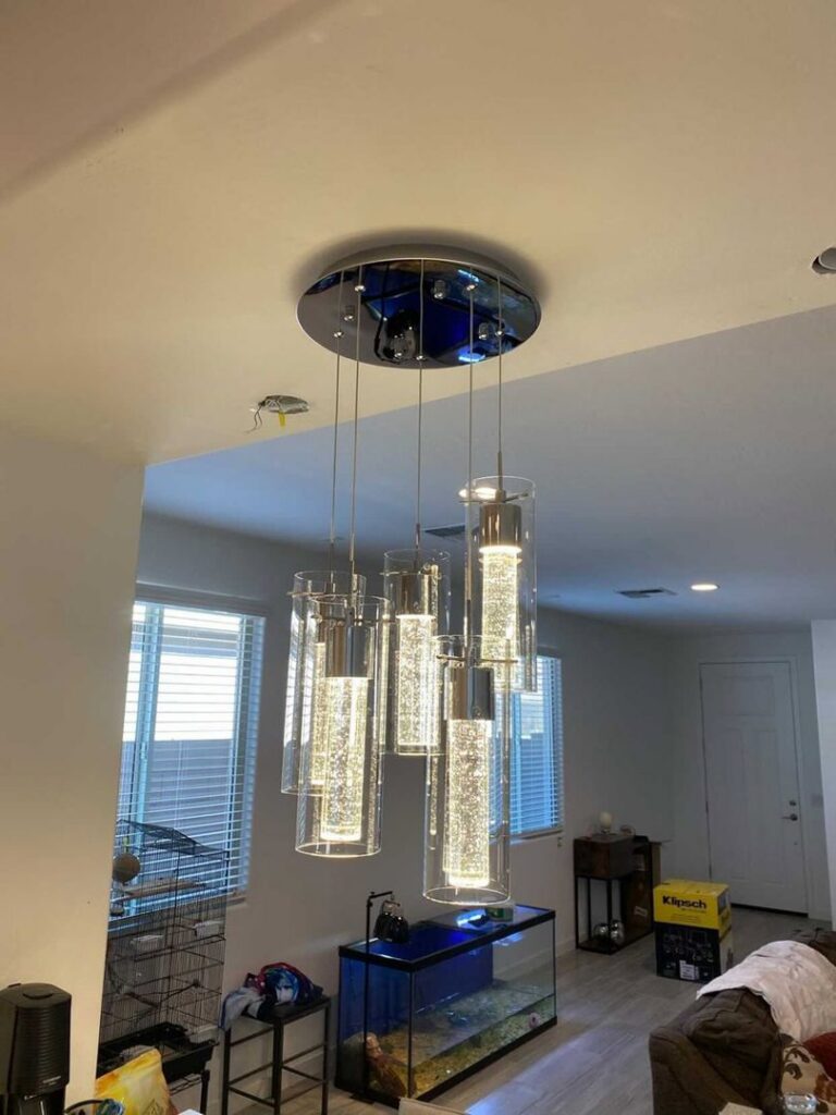 A modern multi-cylinder pendant light fixture installed by Pro Solutions Electric in Glendale, AZ.