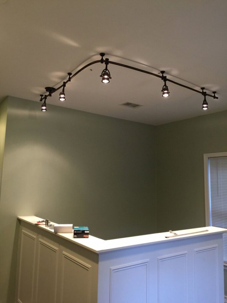 Stylish modern track lighting installed on a ceiling by Abe Electric LLC, providing versatile illumination in Wallingford, CT.