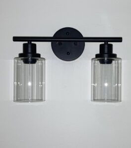 A modern black two-light vanity fixture installed by Goodie's Electrical Contractors LLC in Dothan, AL