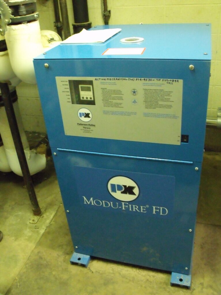 A blue Patterson-Kelley Modu-Fire FD boiler unit, serviced by Action Mechanical LLC in Eau Claire, WI.