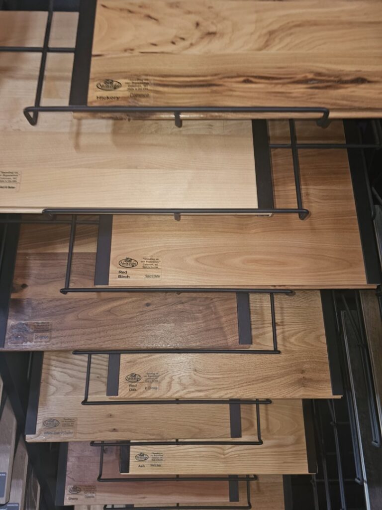 A sample of Mohawk Coastal Couture Plus grey wood-look plank flooring offered by Bronco Carpets and Flooring in Caldwell, ID.