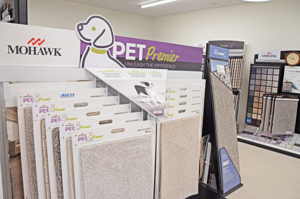Mohawk Pet Premier carpet display, ideal for pet-friendly homes, at Luke Brothers Flooring in Ankeny, IA.
