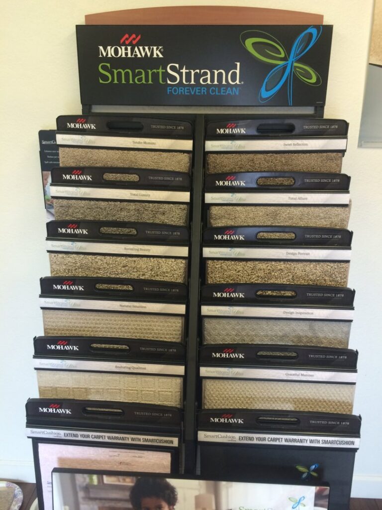 A display of Mohawk SmartStrand carpet samples at Artesano Flooring LLC in Phoenix, AZ
