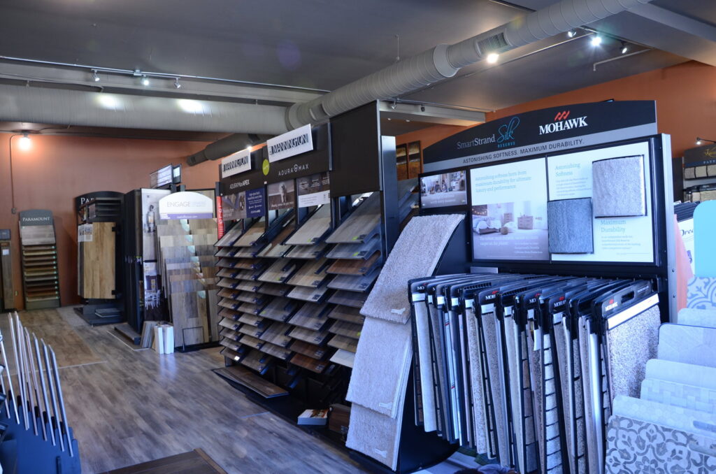 Mohawk SmartStrand Silk carpet samples displayed in the showroom of Home 360 Flooring Company in Columbus, NE.