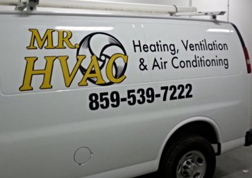 A close-up of the side of a Mr. HVAC branded service van, displaying heating, ventilation, and air conditioning services in Lexington, KY.