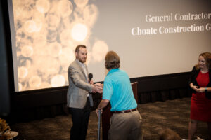 Modern multi-story lounge with vibrant patterned carpet installed by DCO Commercial Floors in Atlanta, GA.