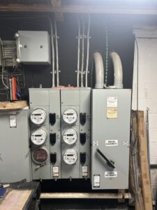 Installation of multiple electrical meters and service disconnects for a building by D&M Master Electric LLC in Newark, NJ.