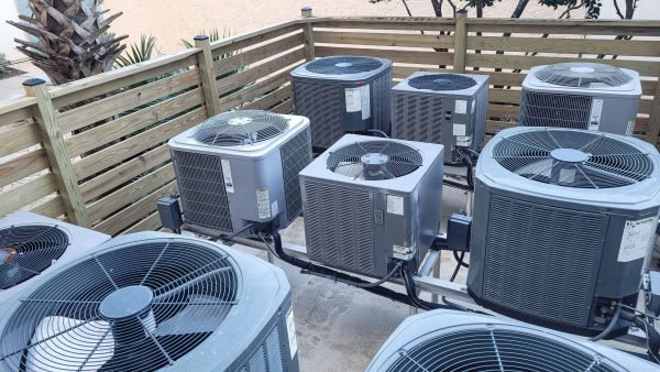 Multiple commercial rooftop air conditioning units maintained by Chill Out Heating and Cooling in Tulsa, OK.