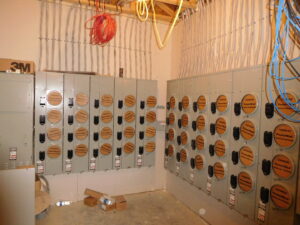 A wall of multiple Siemens electrical meter panels installed by Bonham Electric, Inc. in Sacramento, CA.