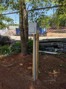 Multiple electrical panels and extensive wiring installed on a wooden wall by Starnes Electric LLC in Rock Hill, SC.