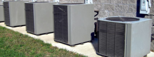 Multiple outdoor HVAC condenser units installed by Dooley Heating & Air in Roanoke, VA.