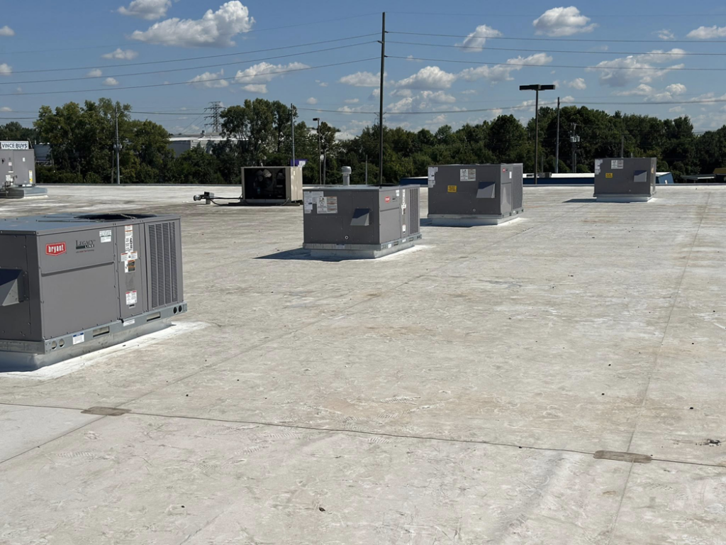 Multiple new commercial rooftop HVAC units installed by Air Conditioning Experts in Orlando, FL.