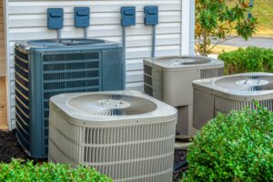 Several outdoor air conditioning units installed outside a commercial building by Boykin Air Conditioning Services in Sumter, SC.