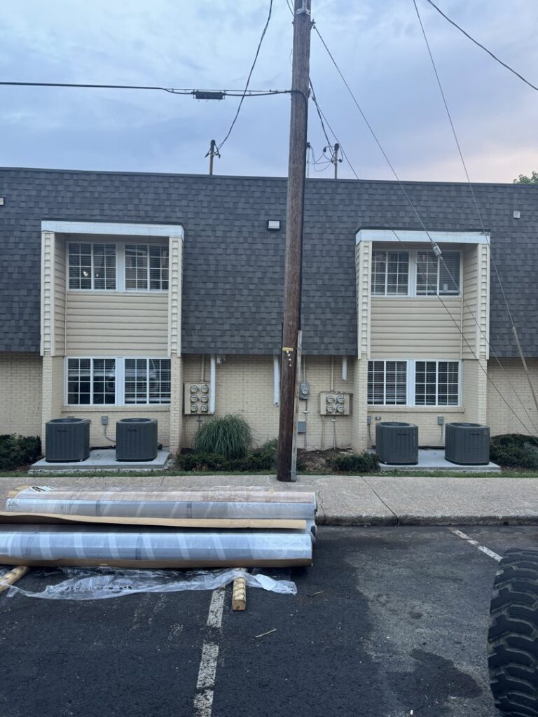Multiple outdoor HVAC condenser units installed outside a building by Federal Heating & Cooling in Dresden, OH.