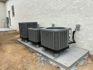 Installation of multiple outdoor HVAC condenser units by ACE Heating & Cooling, Inc. in Jonesboro, AR