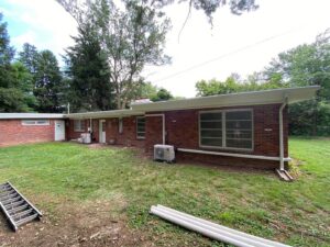 Multiple outdoor mini-split units installed on the back of a house by P3 Mechanical Heating & Cooling in Bainbridge, PA.