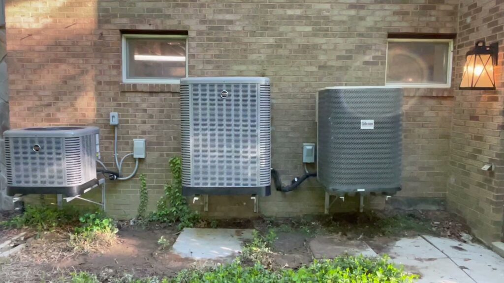 Multiple outdoor residential air conditioning condenser units installed by GT Mechanical Services in Baltimore, MD